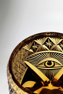 Amber Edo Kiriko whiskey glass with engraved Eye of Providence pyramid