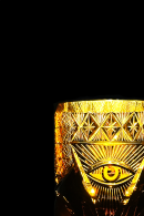 Amber Edo Kiriko whiskey glass with engraved Eye of Providence pyramid