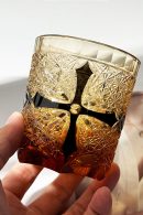 Edo Kiriko cross crystal whiskey glass with golden cut and starburst patterns