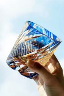 Edo Kiriko starburst whiskey glass in blue and amber dual-tone crystal
