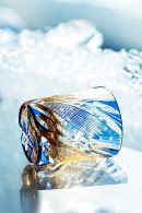 Edo Kiriko starburst whiskey glass in blue and amber dual-tone crystal